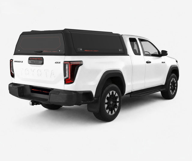 Toyota Hilux Travo extra cab with a black Xpedition canopy