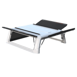 Xpedition canopy with a white frame and black doors, side doors open