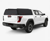 Toyota Hilux Travo dual cab with a black Xpedition canopy